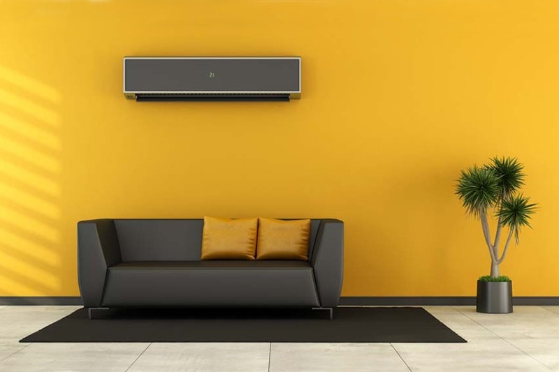 Modern living room with black couch, Consider a Ductless Air Conditioning System | HVAC Install, Cooling, Wrightsville, PA
