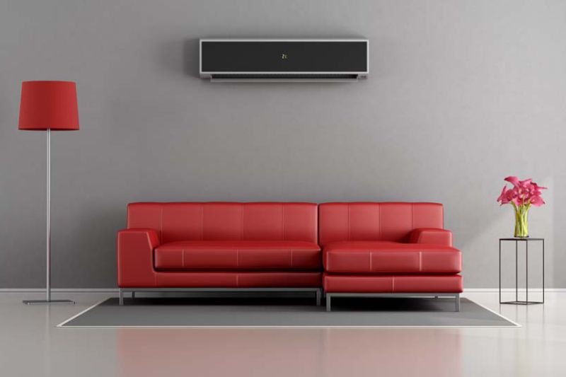 Image of a ductless system above a couch. Planning to Remodel? Go Ductless!